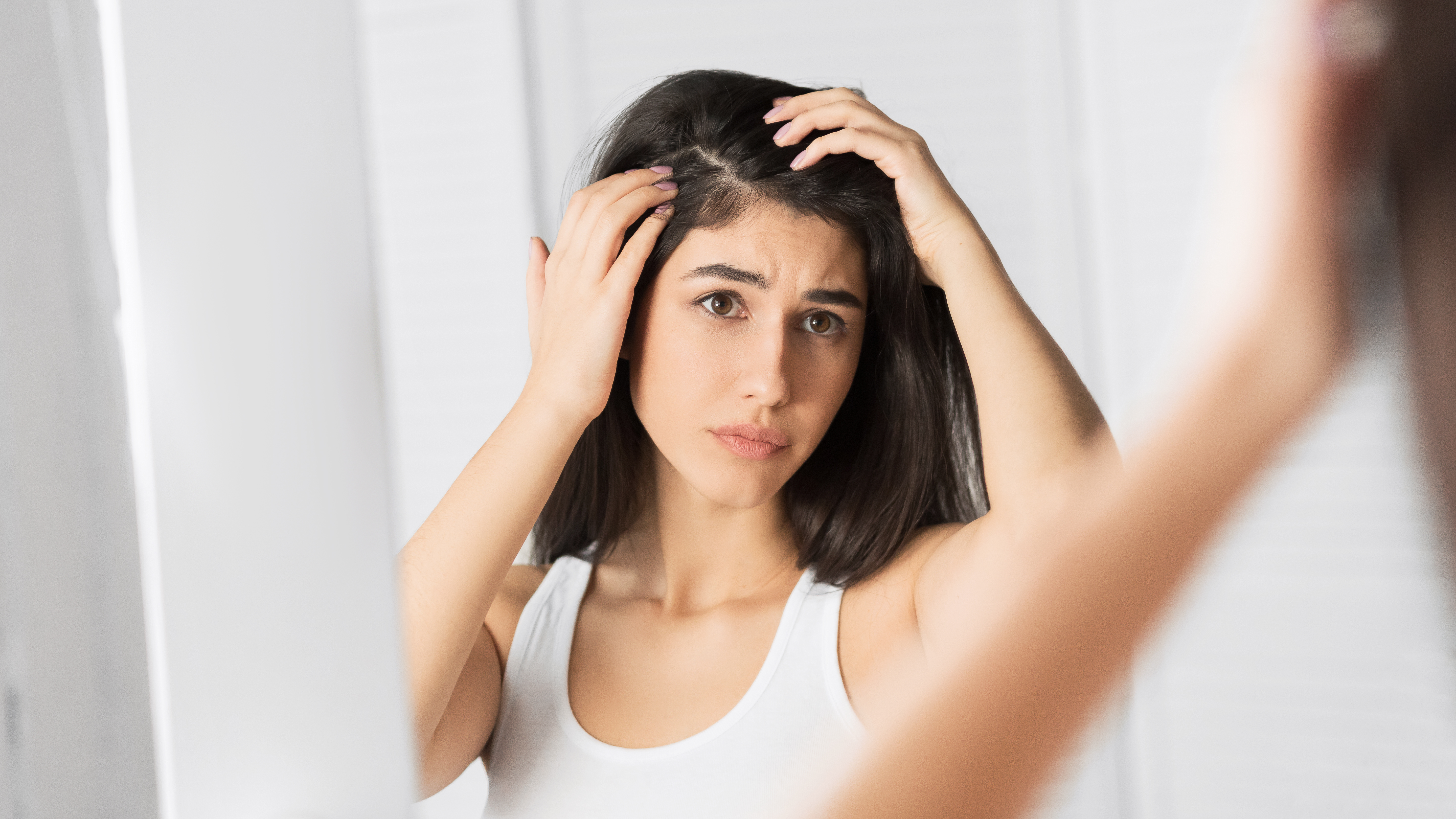 Dandruff Problem. Brunette Girl Looking At Hair Flakes In Mirror Standing In Bathroom. Panorama, Selective Focus